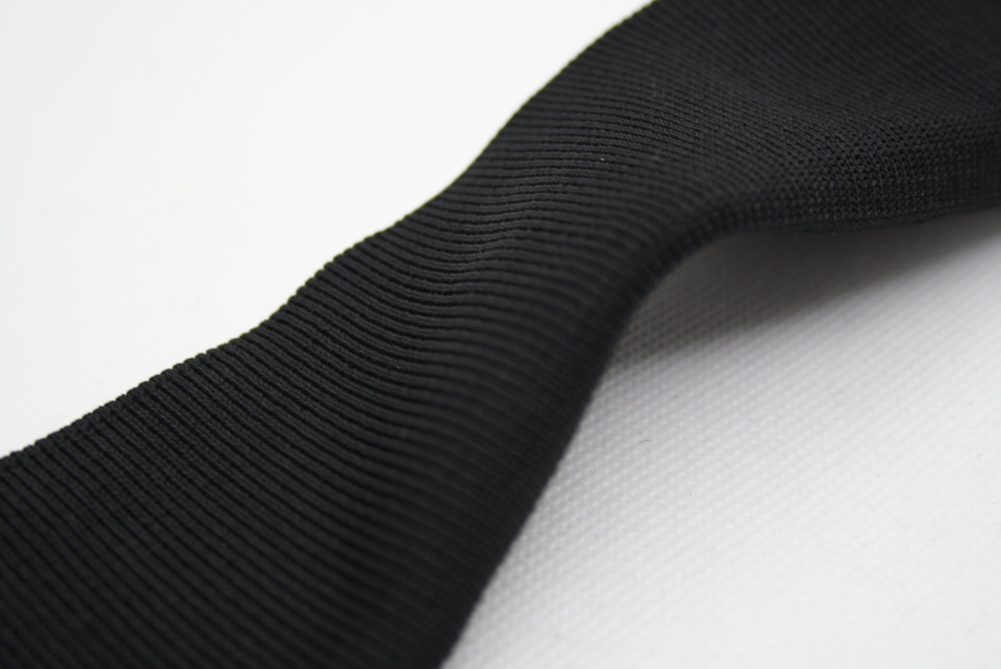 Bord-cote noir en polyester elasthanne cote 1/1