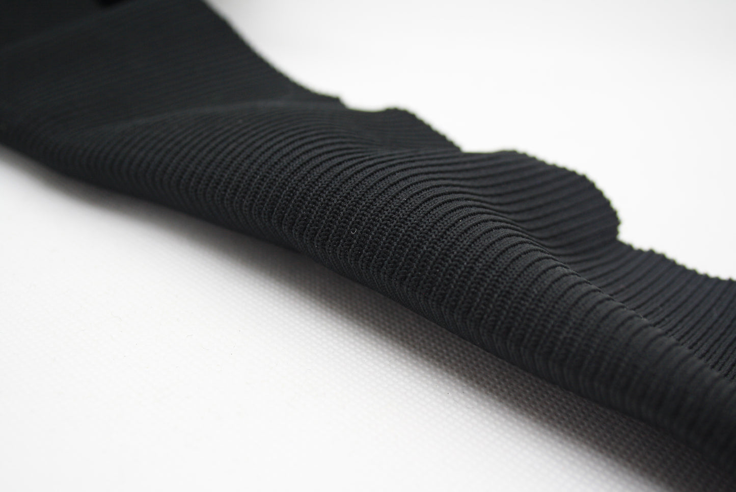 Bord-côte noir polyester et élasthanne