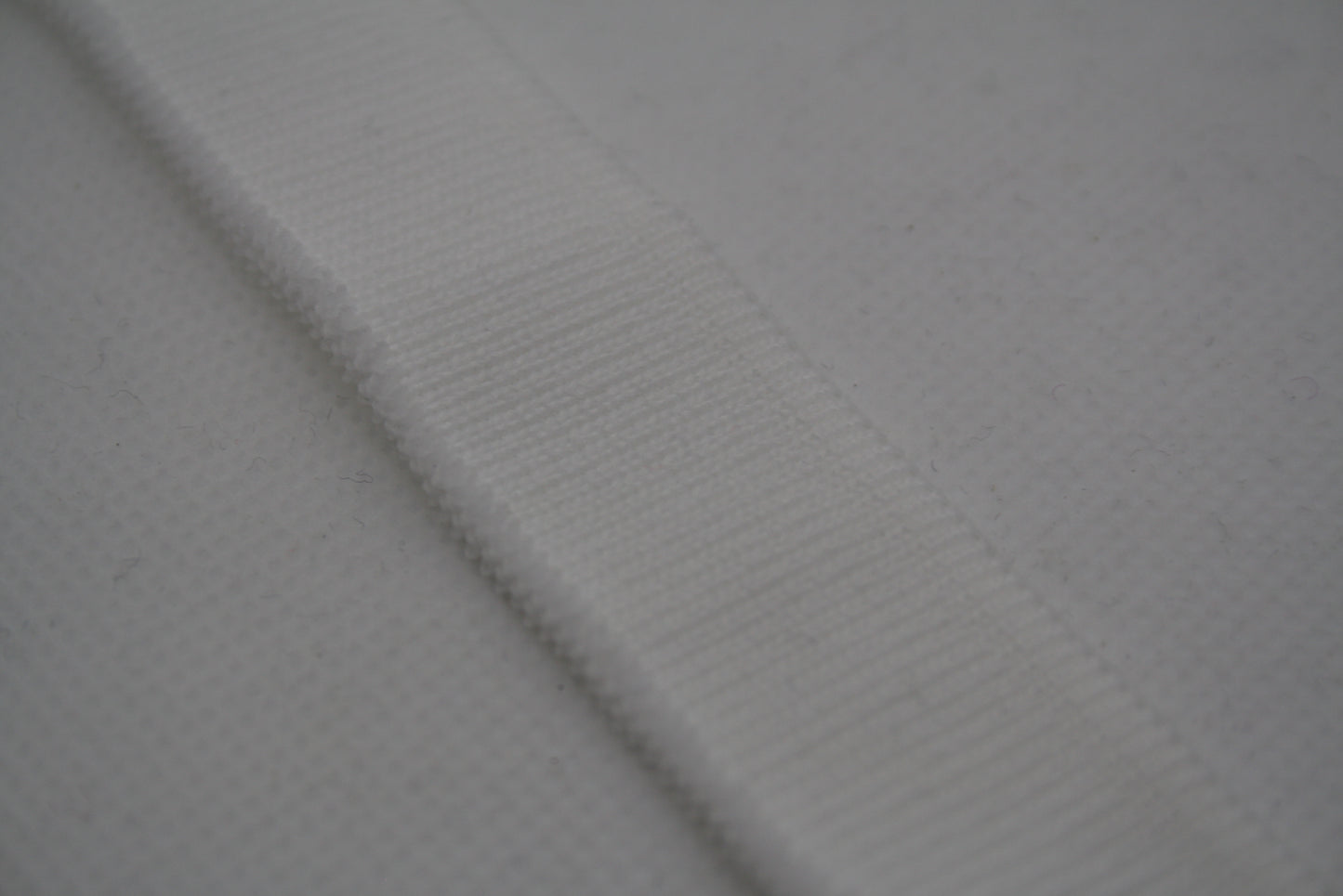 Bord-cote blanc en polyester et elasthanne cote 1/1