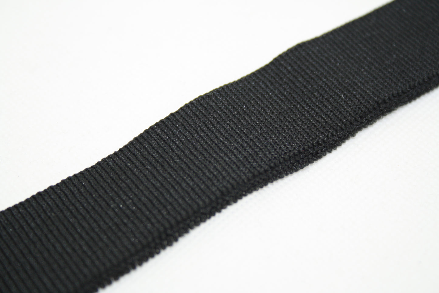 Bord-cote noir en polyester et elasthanne cote 1/1