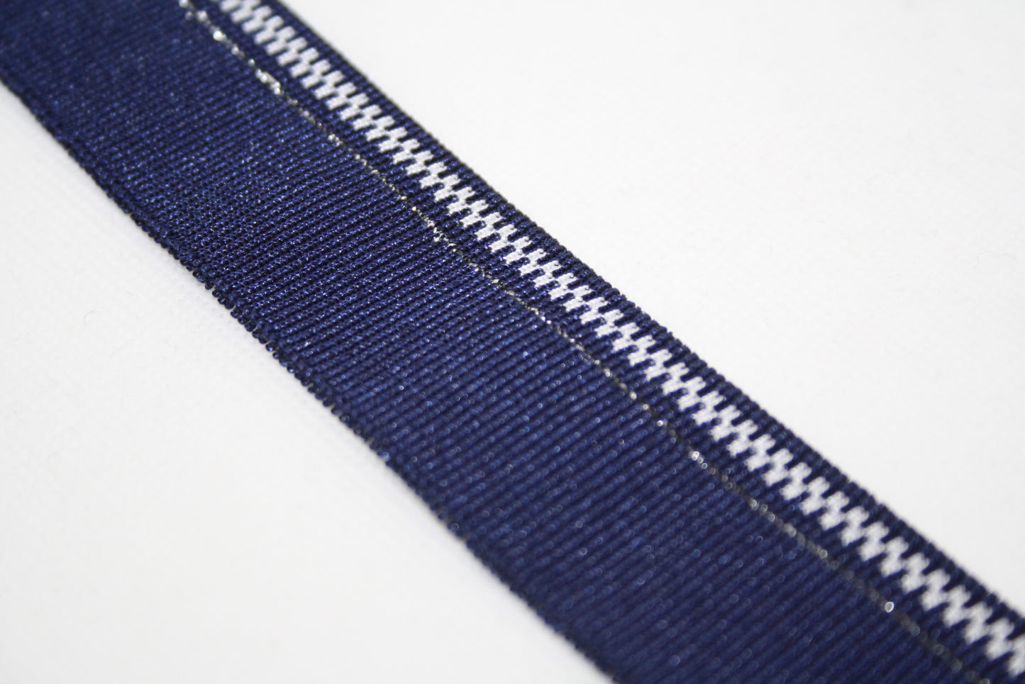 Bord-cote en polyester brillant et elasthanne bleu marine motif zip