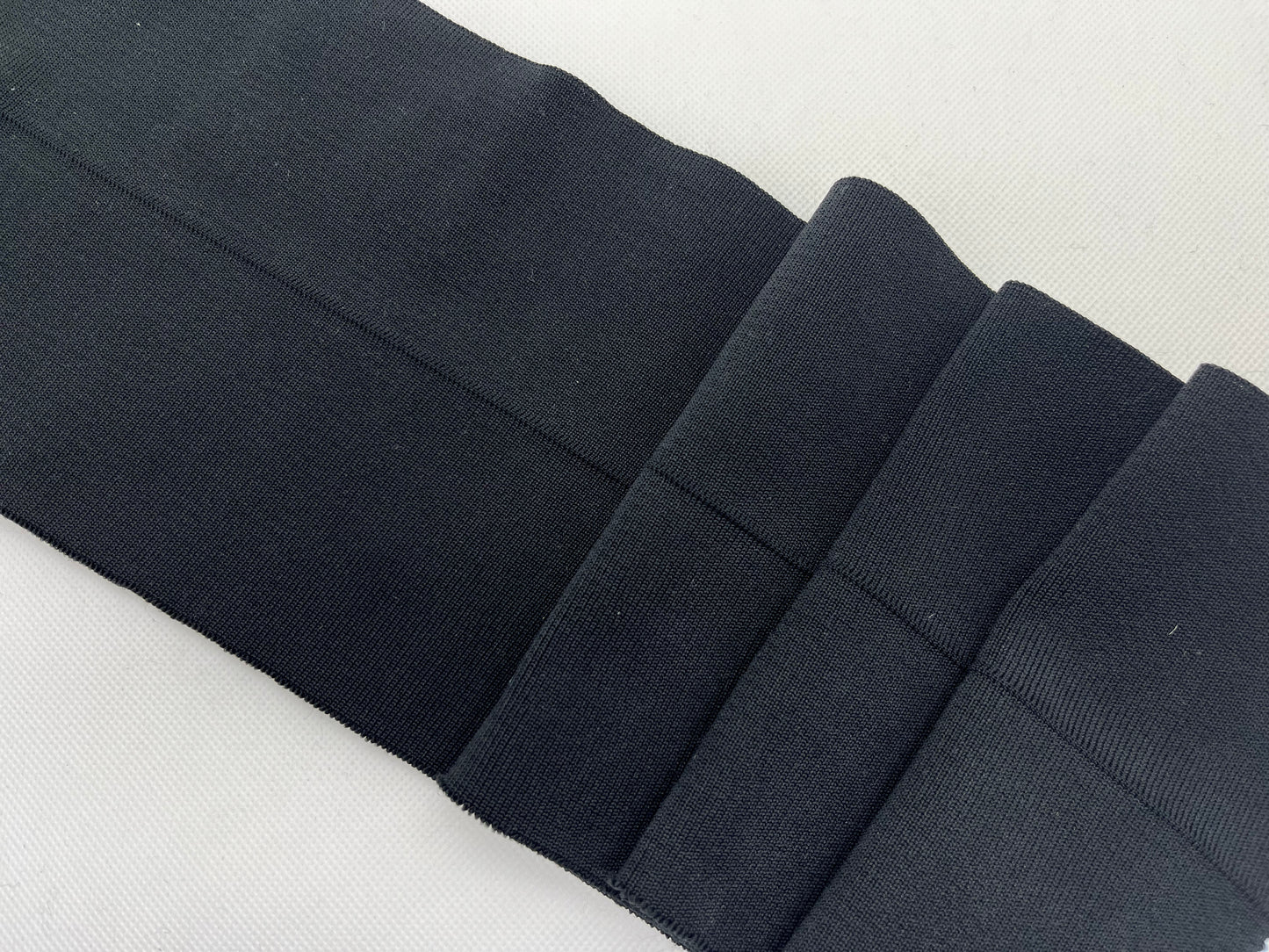Bord-côte noir polyester