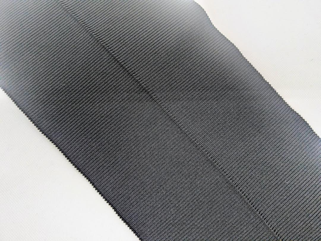 Bord-côte noir en polyester et élasthanne