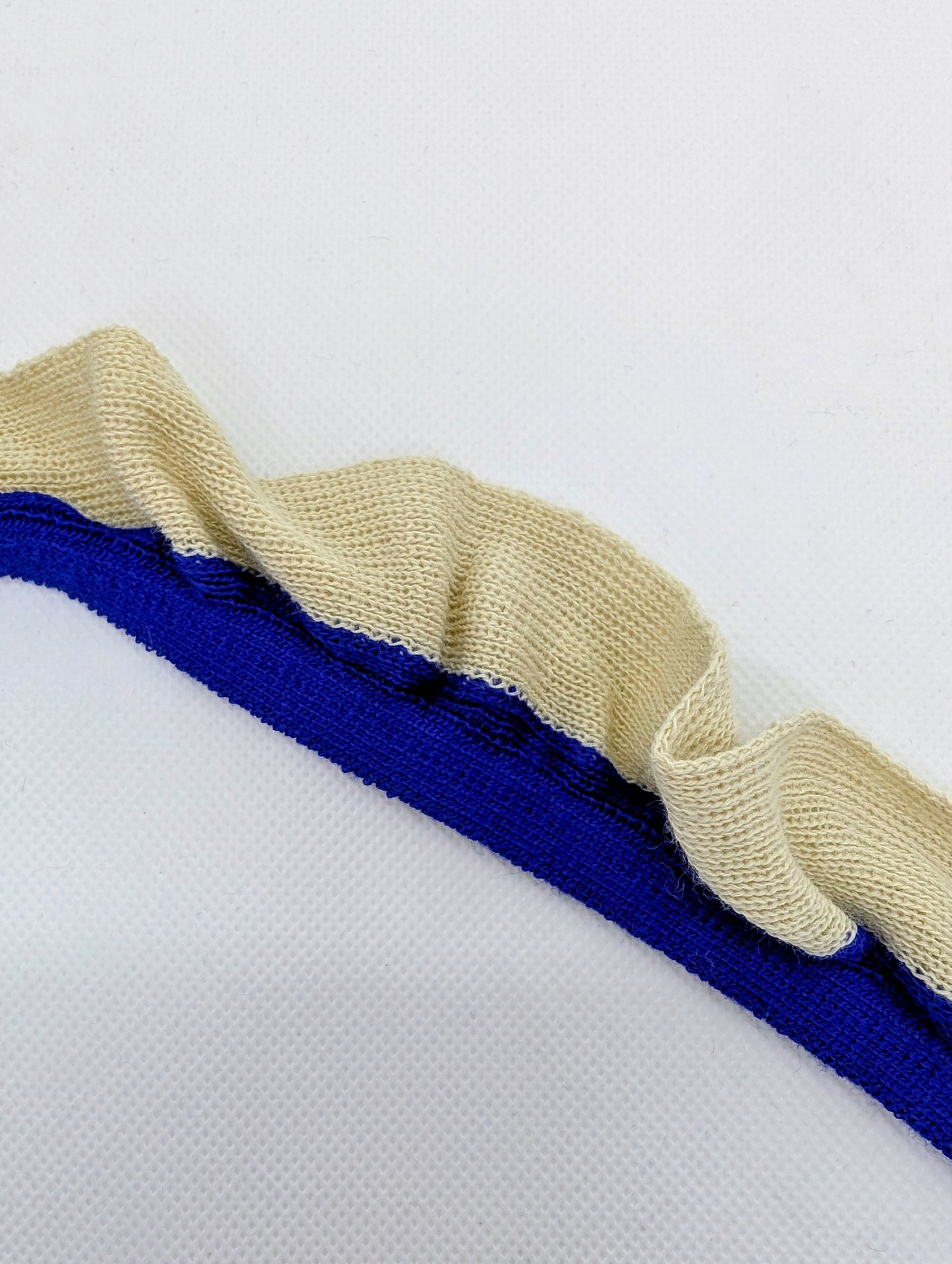 Bord-côte en acrylique et élasthanne avec volant