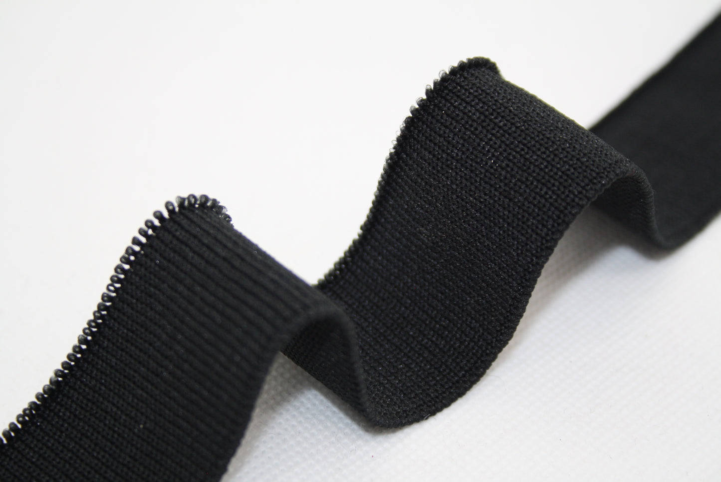 Bord-cote noir en polyester et elasthanne cote 1/1