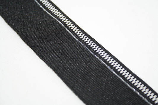 Bord-cote en polyester brillant et elasthanne  motif zip noir et argent