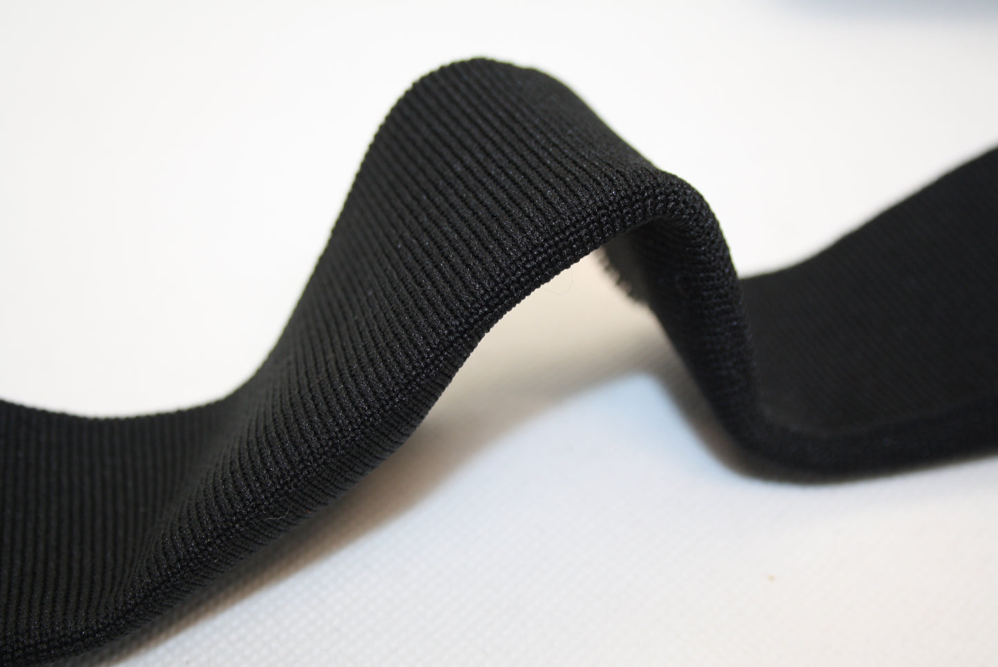 Bord-cote noir en polyester et elasthanne cote 1/1